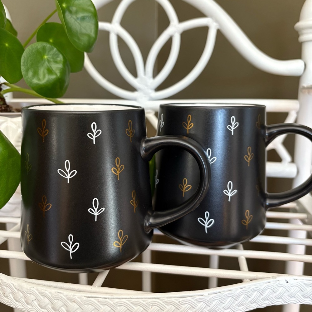 Thyme and Table Black Finish Mugs with Gold and White leaf detail